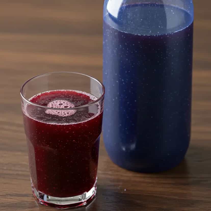 Foto deliciosa de Suco Integral de Uva pronta para servir - Sucos & Smoothies