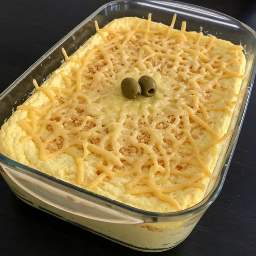 Foto deliciosa de Suflê de Bacalhau Gratinado pronta para servir - Peixes & Frutos do Mar